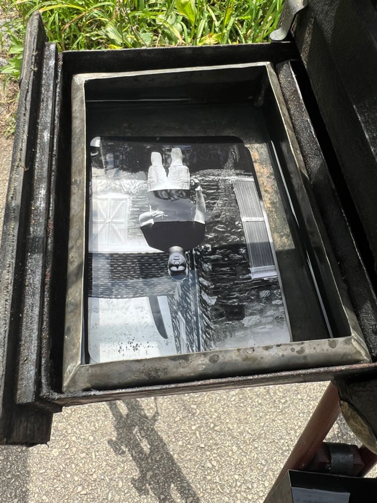 The open rear drawer of my box cam showing a successful negative in a tray of fixer! 