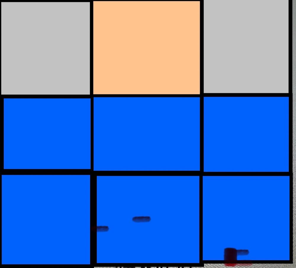 9 colored cubes, vaguely forming a human wearing a blue shirt. 