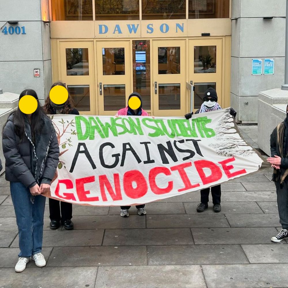 1 of 4 - Slide description: 5 students standing outside in front of Dawson College holding a white, red, black and green banner that reads: Dawson students against genocide.