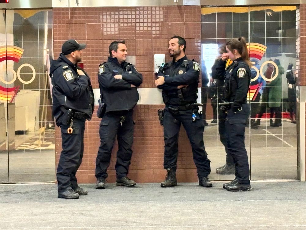 The SPVM officers that were called on protestors by campus security after trying to bar our entry to the Library Building atrium. 10 cop cars were stationed outside.