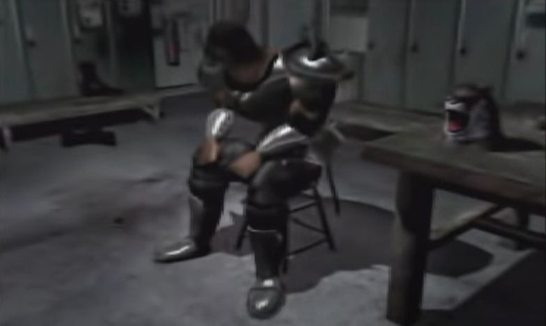 armor king removes his mask to reveal his actual face which is suspiciously the same as his mask