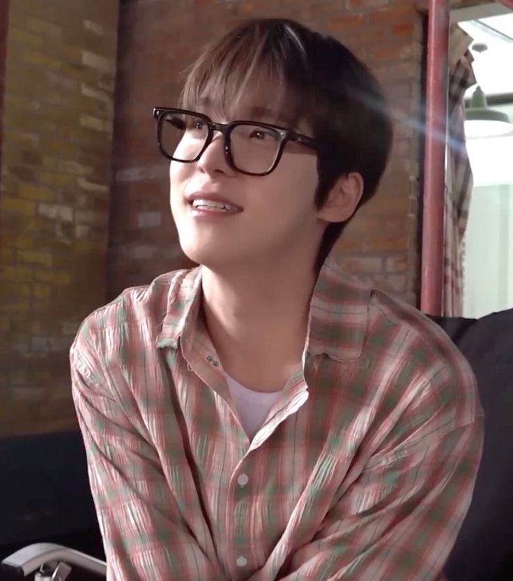 Yunho with glasses from one of the Logbooks