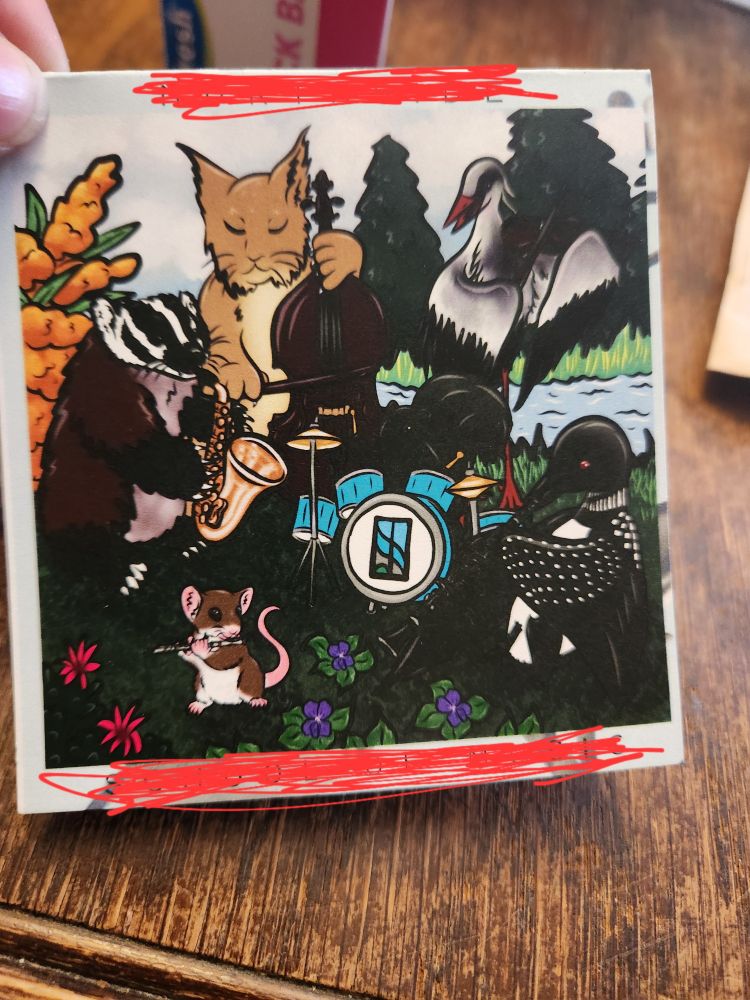 Little card with animals playing instruments.