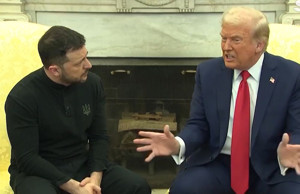 A still photo from the newscast of the Oval Office interview of February 28, 2025 between Ukrainian President Volodymyr Zelensky and President of the United States Donald Trump. Zelensky, seated on the left in front of the fireplace, is patiently listening to an angry Trump, who is seated on the right with hands spread wide in an emotional gesture while he berates Zelensky.