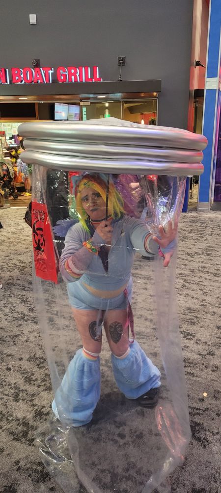 Rainbow Dash cosplayer in a "jar"