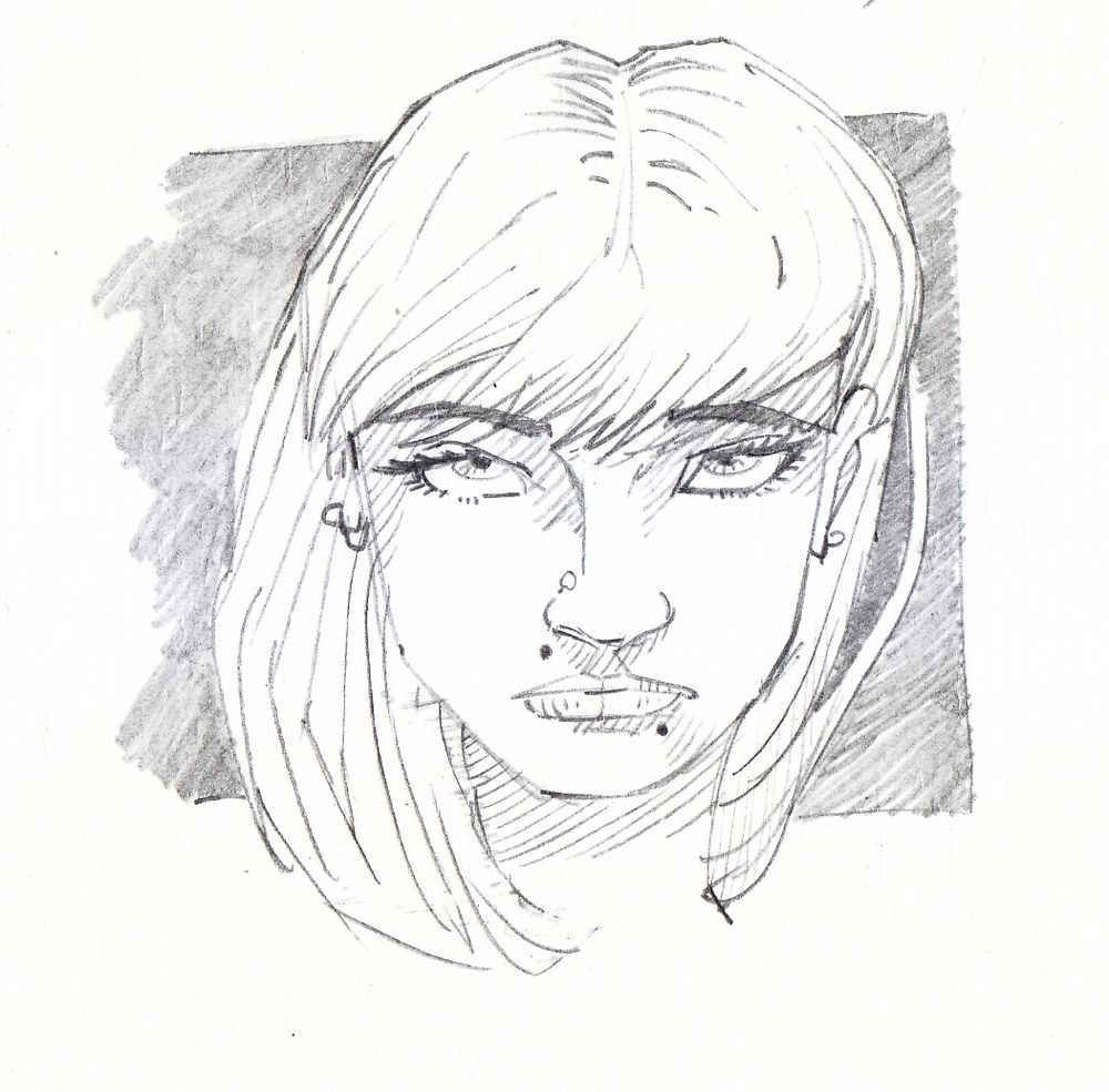 Rosto de uma moça olhando para frente.