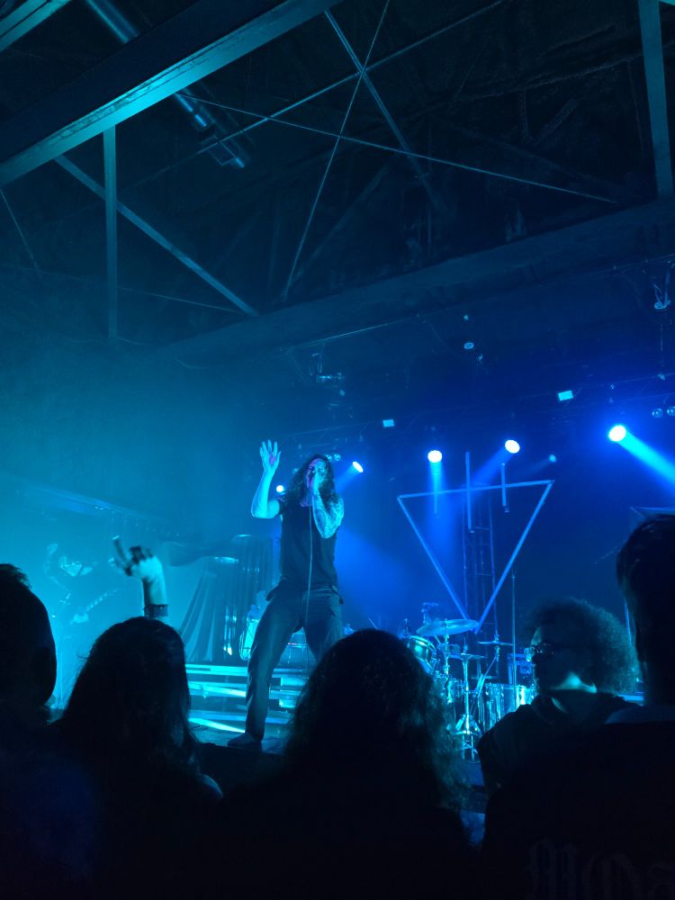 Lead vocalist of Silent Planet absolutely killing it while I try not to get knocked over by the pit.