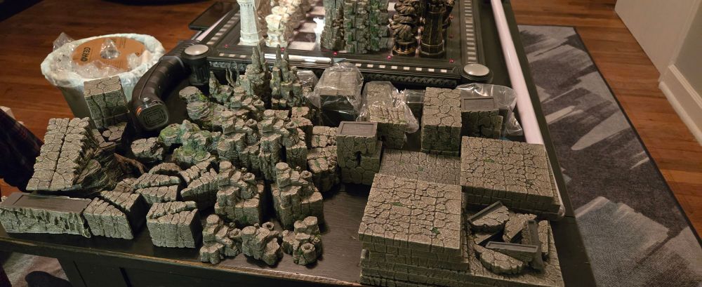 Scattered Dwarven Forge mountain terrain, straight out of the box. 