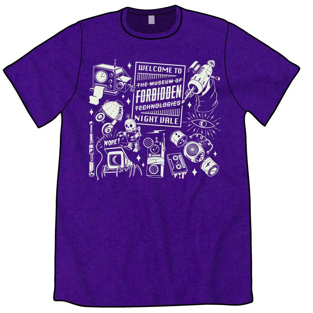 A purple t-shirt with a white design on the front: There are various technologies scattered around. In the middle is a large rectangle with "Welcome to" at the top and "Night Vale" at the bottom. In the middle are the words "The Museum of Forbidden Technologies" and the entire name has been struck through.