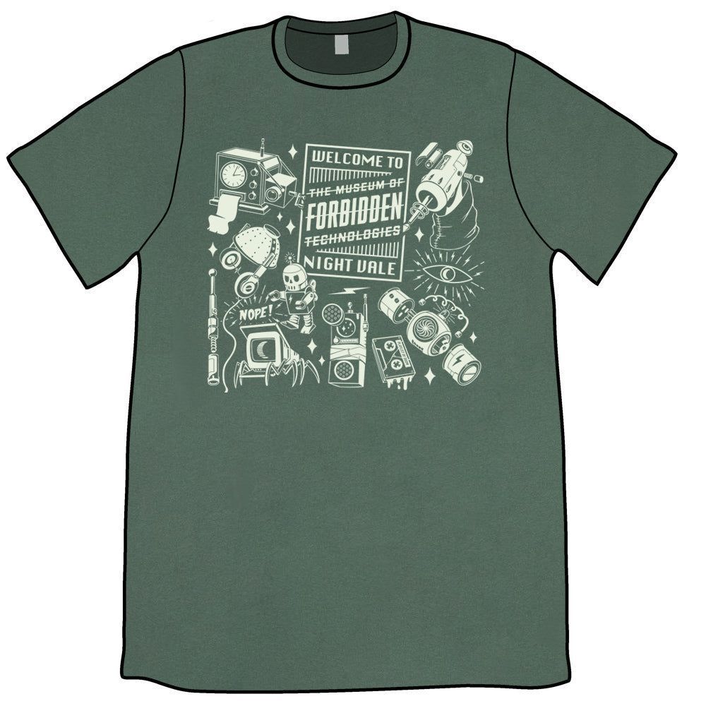 A dark green t-shirt with a white design on the front: There are various technologies scattered around. In the middle is a large rectangle with "Welcome to" at the top and "Night Vale" at the bottom. In the middle are the words "The Museum of Forbidden Technologies" and the entire name has been struck through.