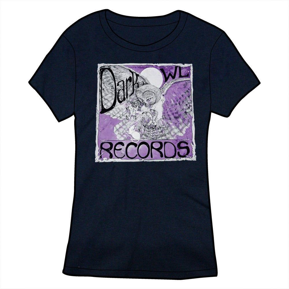 A black fitted t-shirt: across the front is a square with a white border and a purple background. over this is an an owl, wings spread as if about to land. Above and across the wings are the words: Dark Owl. The "O" in owl is a moon. At the bottom is the word "Records."