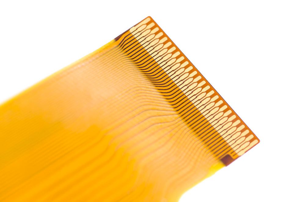 Flexible printed circuit ribbon cable, which is extremely thin and fragile.
