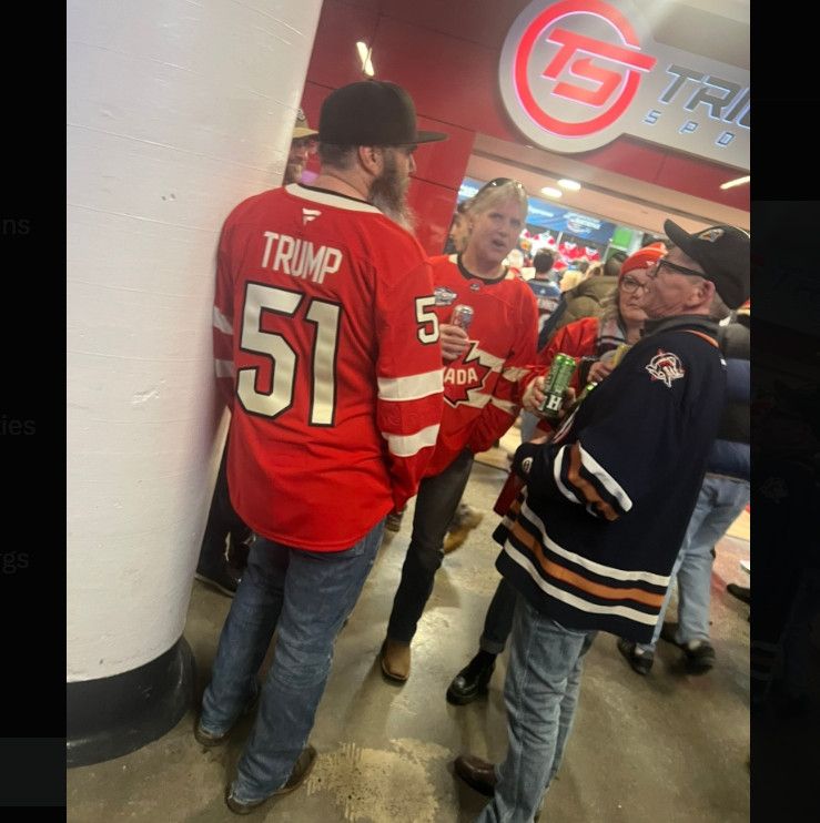 Chud wearing Team Canada hockey jersey with "Trump 51" emblazoned on back 