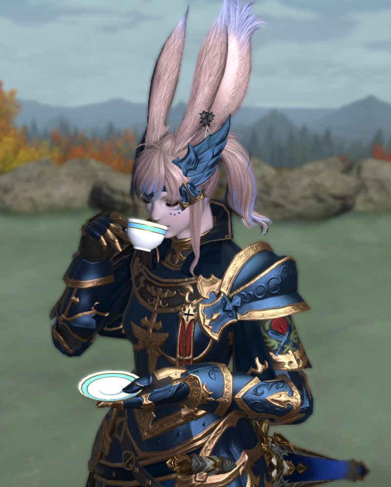 Screenshot of a pink haired viera wearing blue and gold armor sipping a tea cup from Final Fantasy XIV