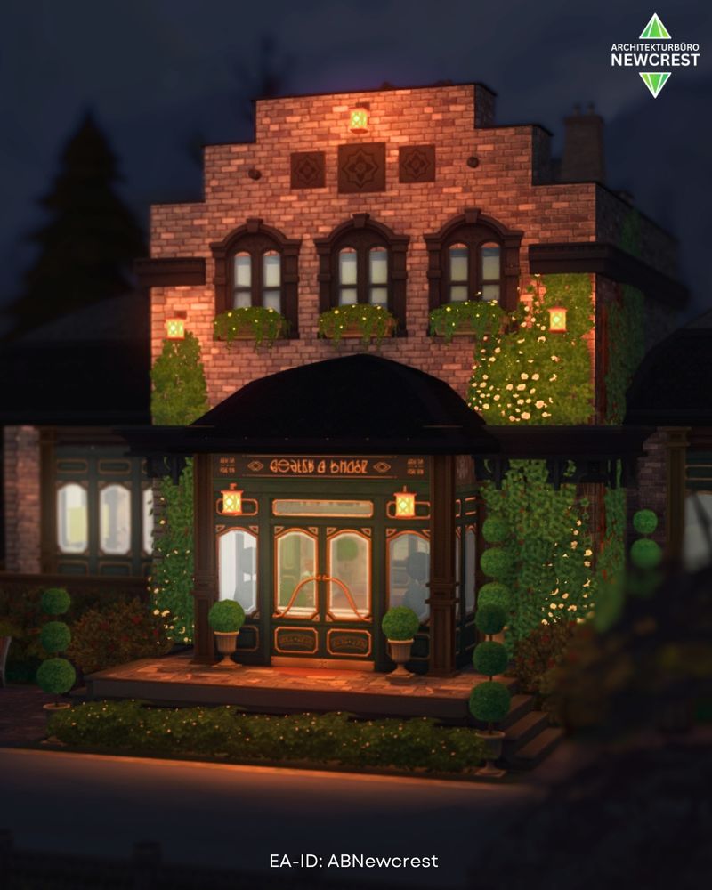 The build at night, illuminated by lanterns with warm orange light