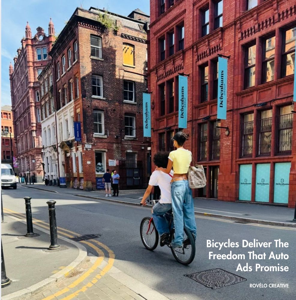one person pedalling a bicycle with another standing on the back on a city street.

Bicycles deliver the freedom that auto ads promise