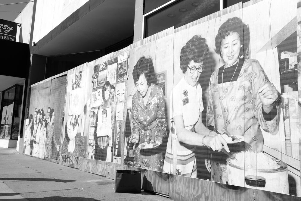 The Jangs photo series wheat pasted mural over the boarded up GoodWill storefront during the Omnicron wave, San Francisco, CA 2021

Photo by Jessica Chen