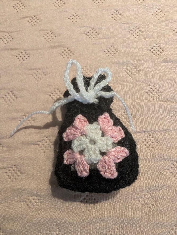 Granny square lavender pouches in white, pink and black 