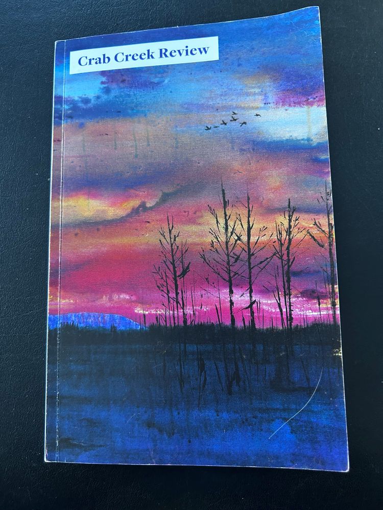 The cover of Crab Creek Review, with sunset art by Linde Husk