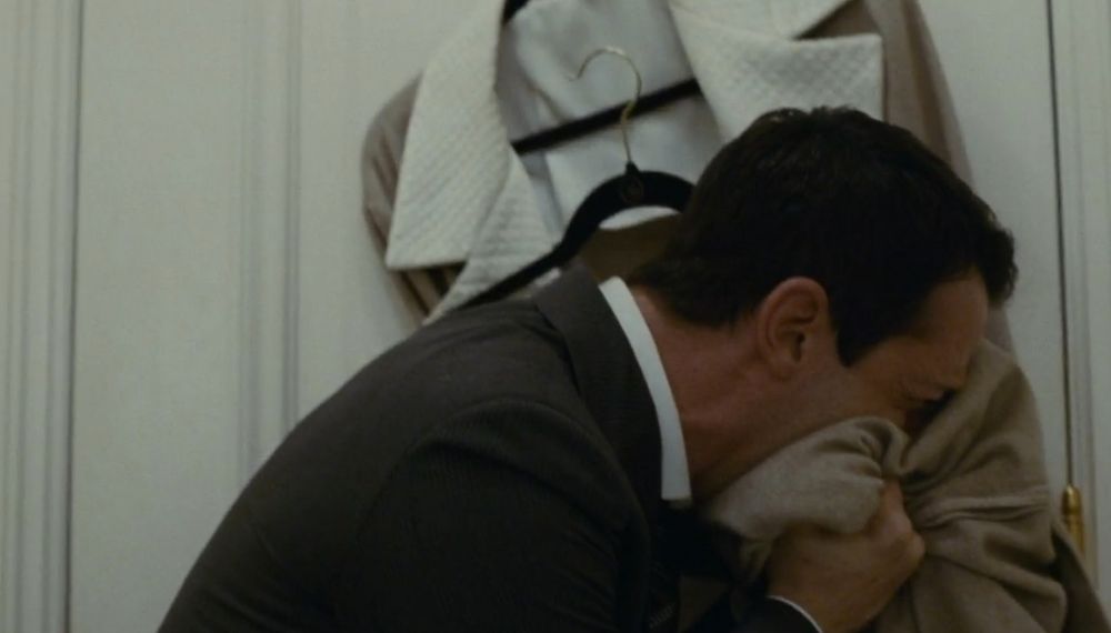 A screenshot from the pilot of Succession of Kendall Roll freaking out in his father's fancy bathroom and screaming into a bathrobe.