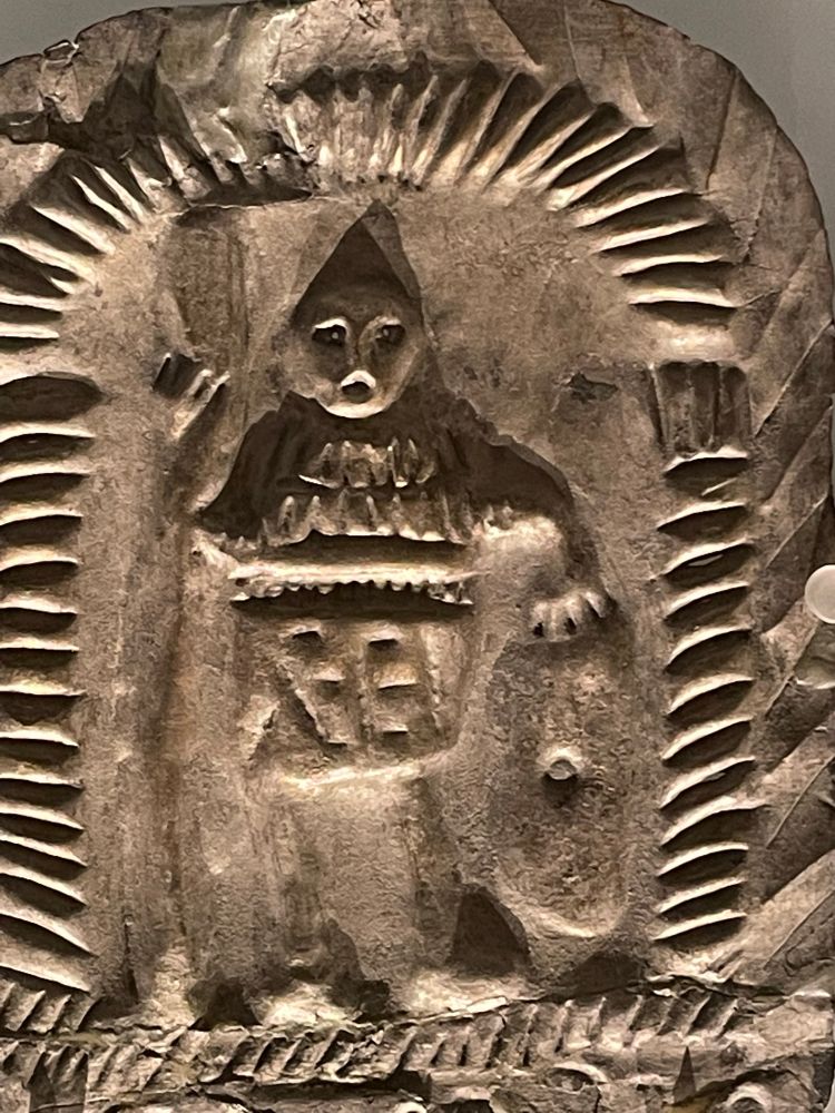 Close-up of plaque to Cocidius, showing the god standing in a columned niche, holding a spear and shield 