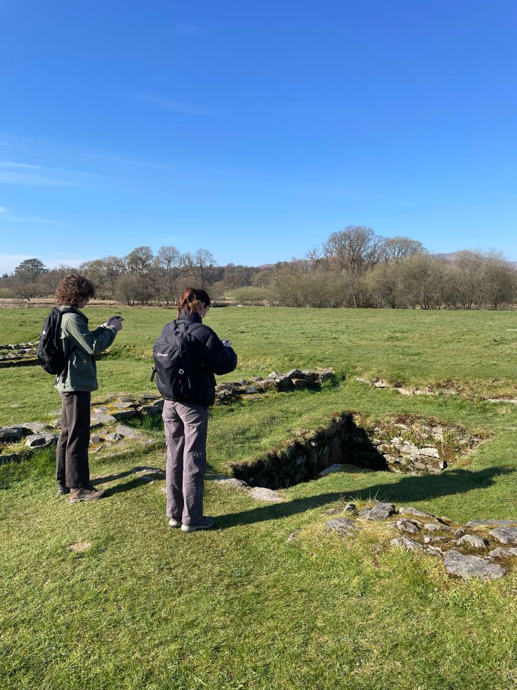 Rowan and Isla taking photographs at Ambleside Roman Fort 