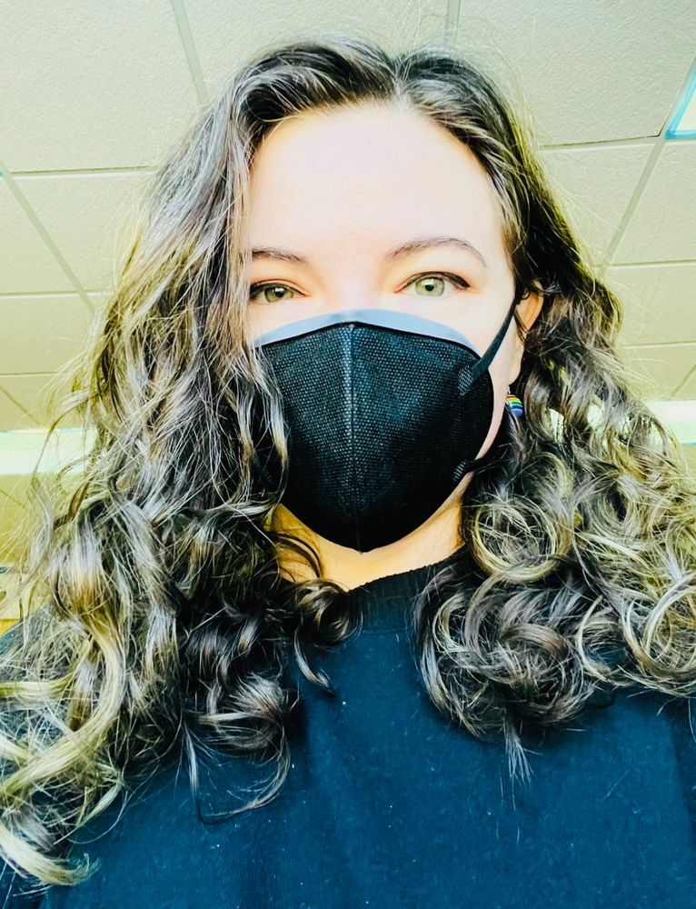 I'm wearing a black zimi air mask and a black sweater. 
