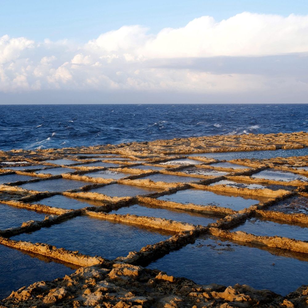 Beautiful salt pans along the Żebbuġ coastline in Malta, with a striking sea view.