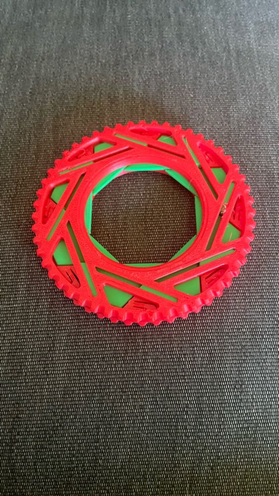 Fidget toy in open position printed  in Red and Green PLA