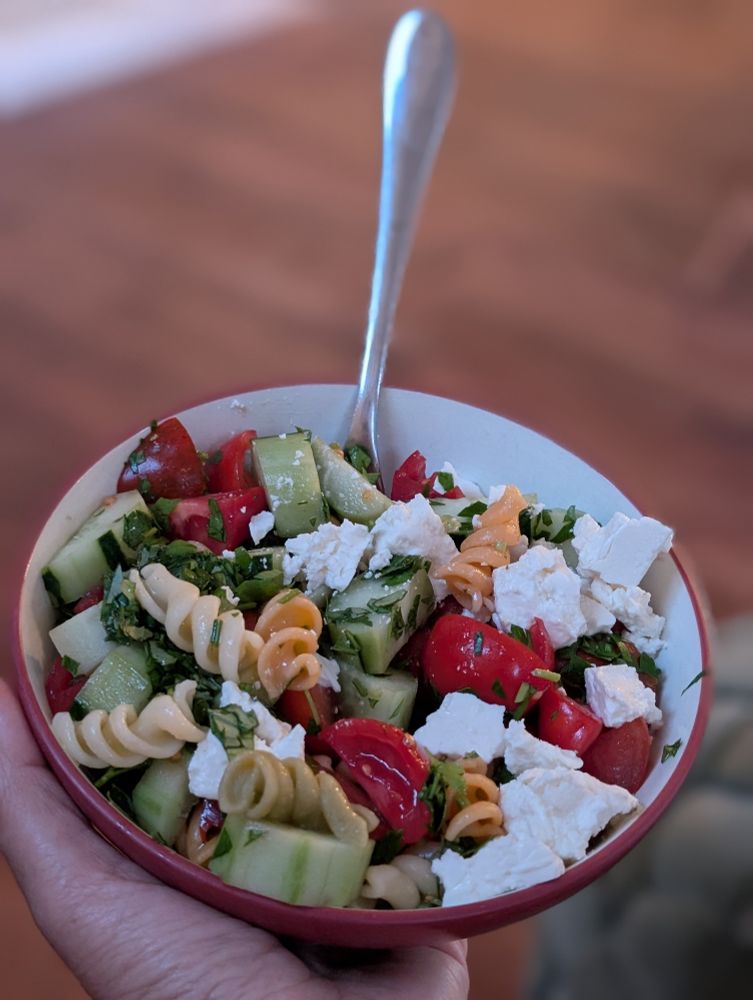 Pasta, tomato, cucumber and feta salad. 