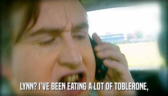 Alan Partridge on the phone in his car saying: "Lynn? I've been eating a lot of Toblerone" after driving shoeless to Dundee.