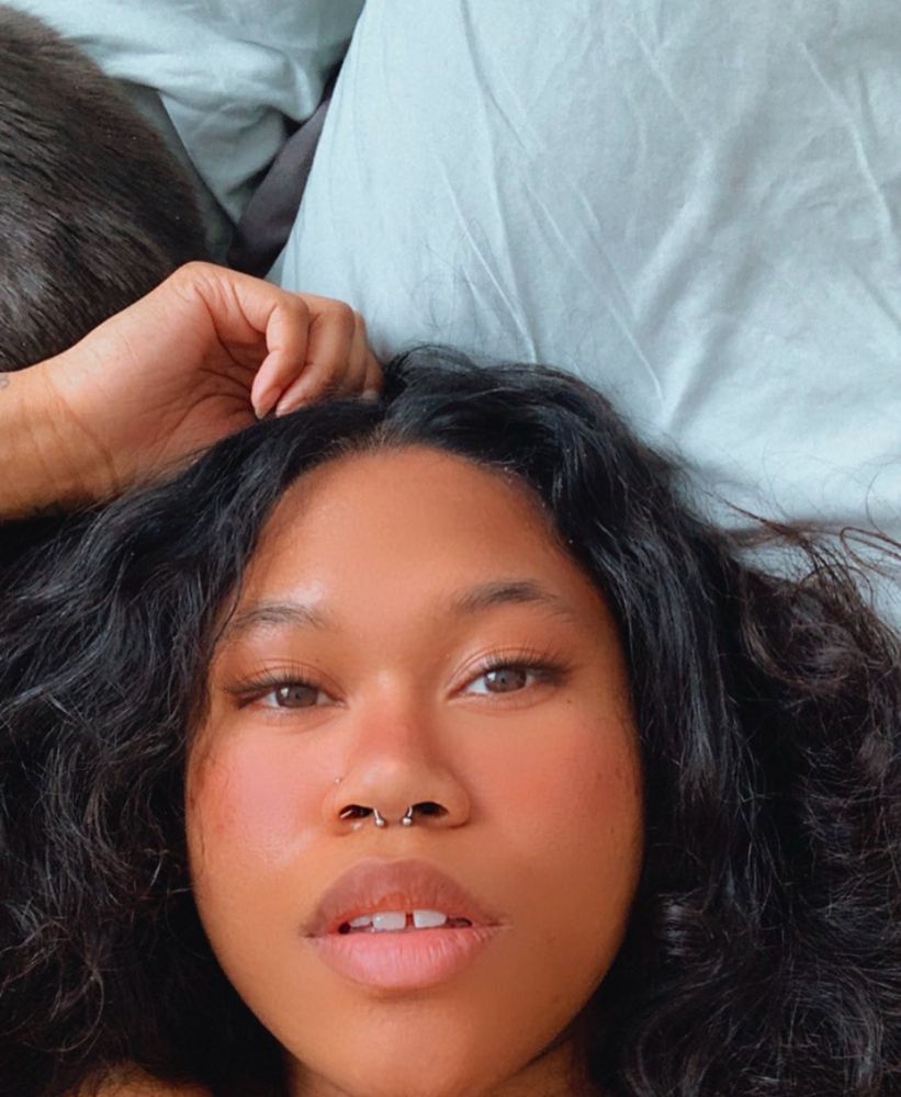 close up to chaise’s face. septum piercing. 