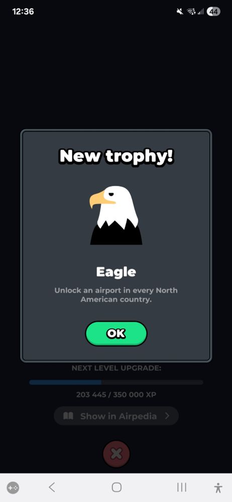 Screenshot from Skycards showing new trophy! EAGLE. Unlock an airport in every North American country. Been working on it for weeks!! 