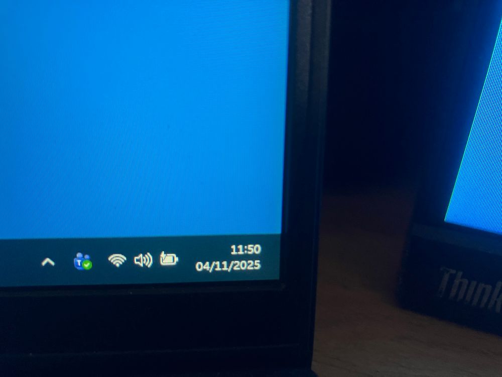 Photo taken at 12:02 showing 11:50 on my windows notification area clock. 