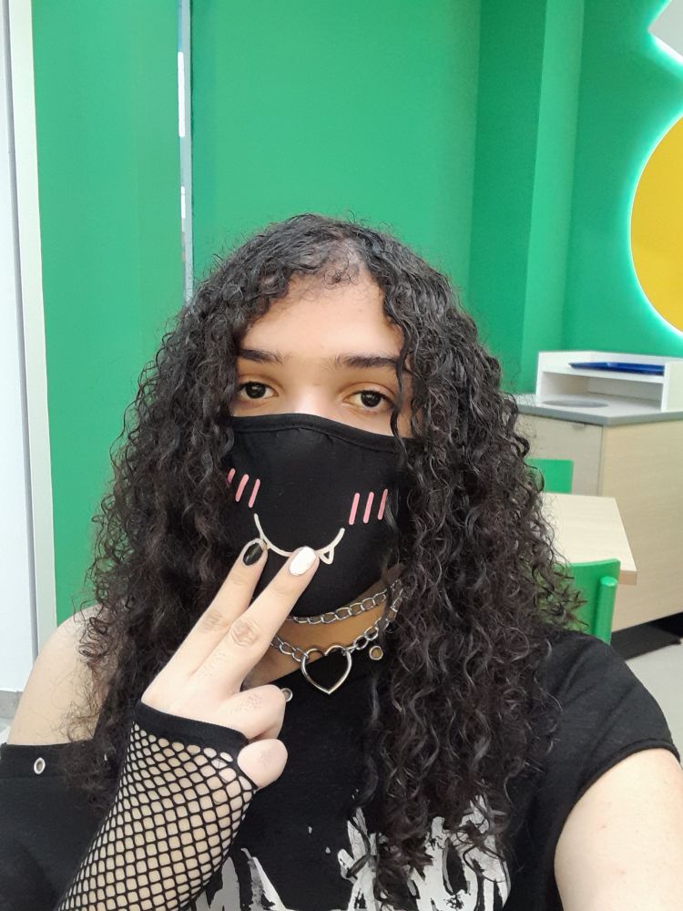 Me but trying to do something with my hands showing them painted in black and white