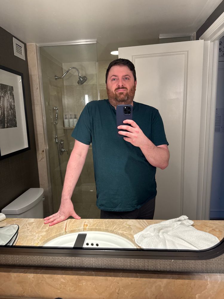 Selfie in a hotel bathroom mirror 