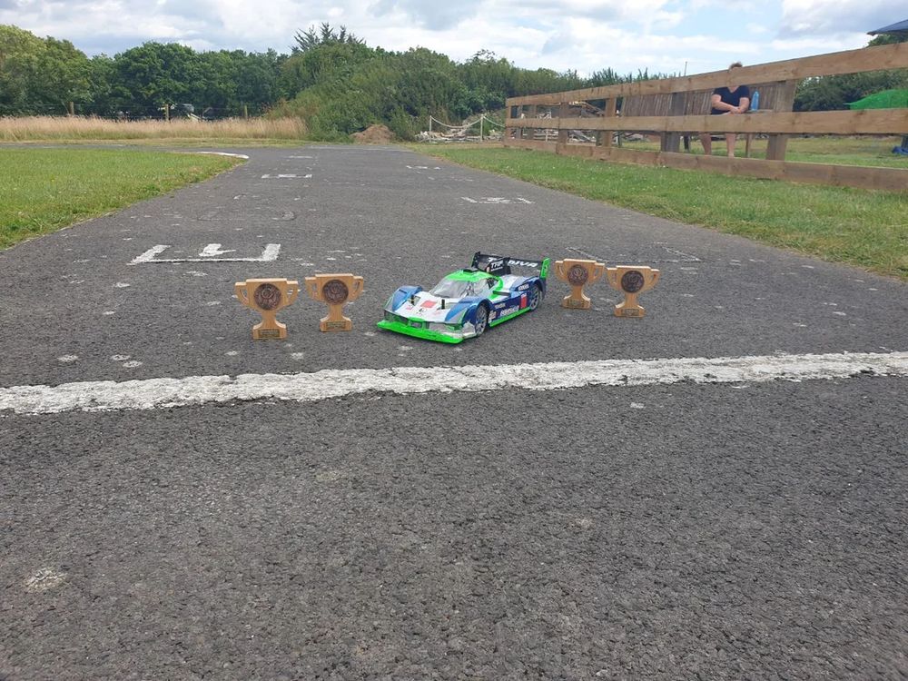 Our car post race with the 3rd place trophies for each of our drivers 