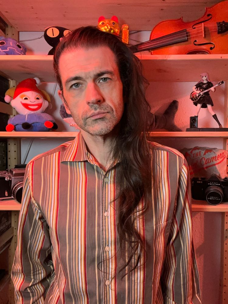 Some middle aged white dude with hair that has been growing for 1743 days 