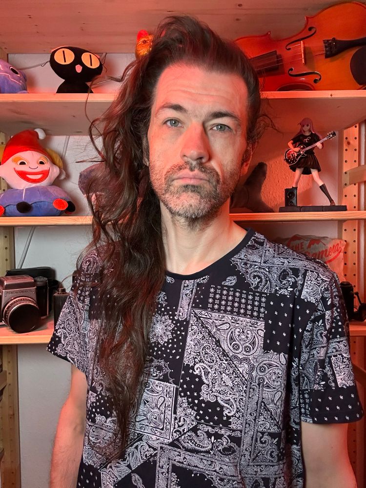 Some middle aged white dude with hair that has been growing for 1656 days 