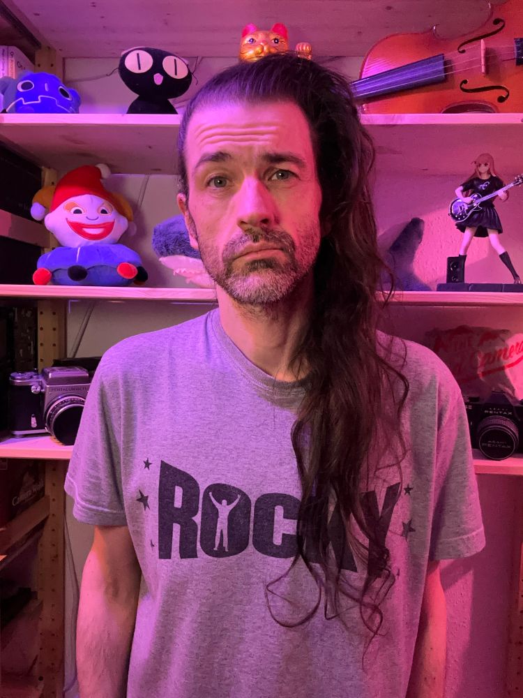 Some middle aged white dude with hair that has been growing for 1754 days 