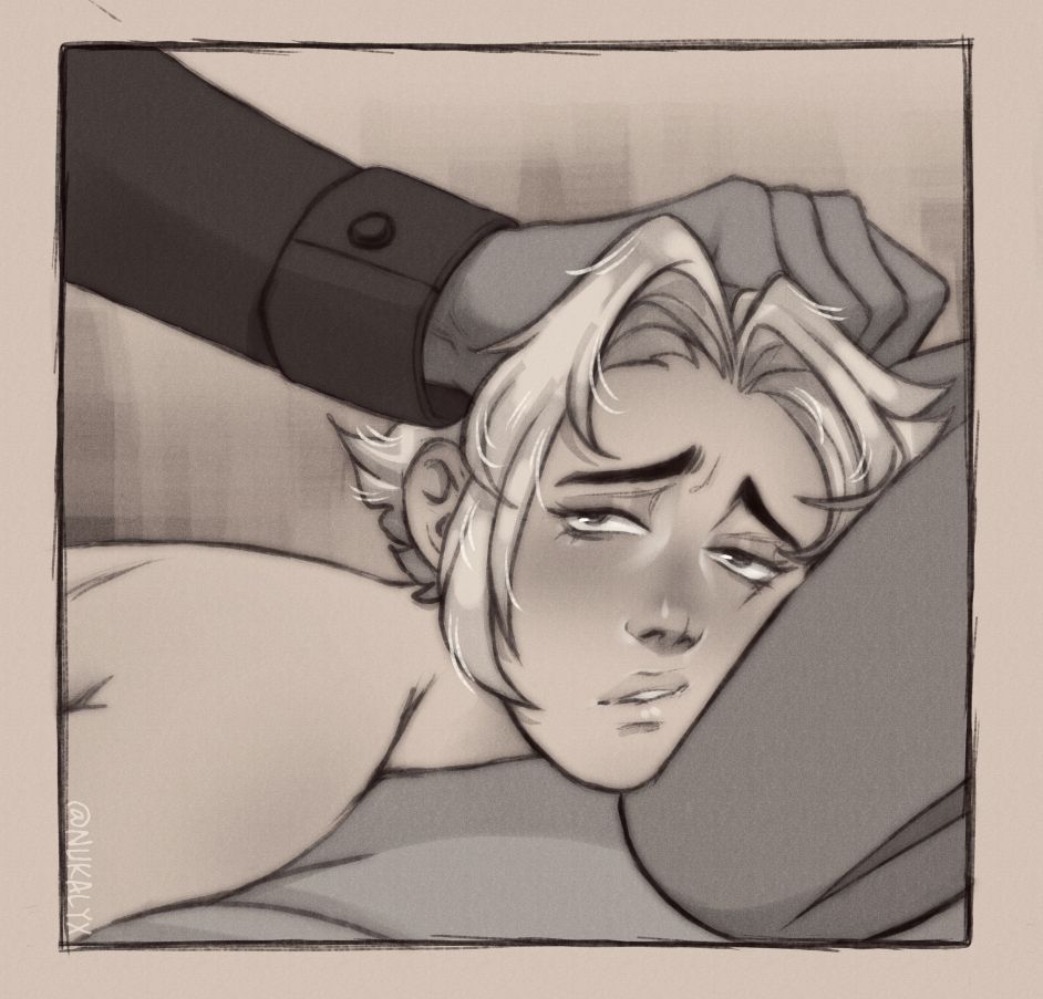 Dude's head pinned down on a pillow with a lustful expression on his face.