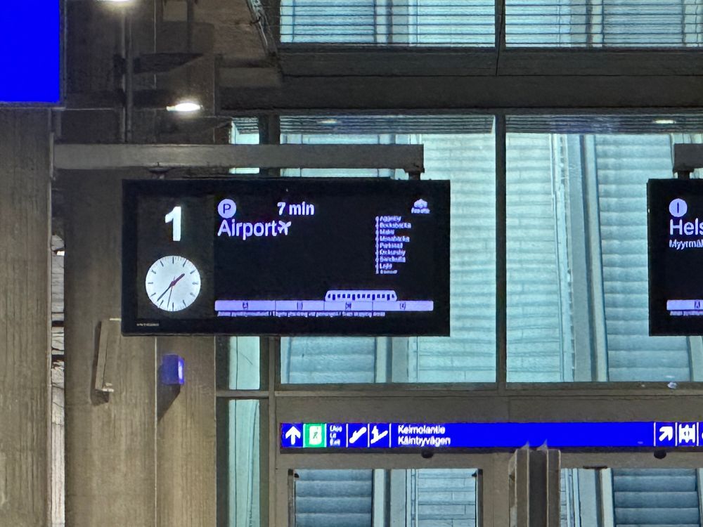Trainstation Track sign saying Airport 