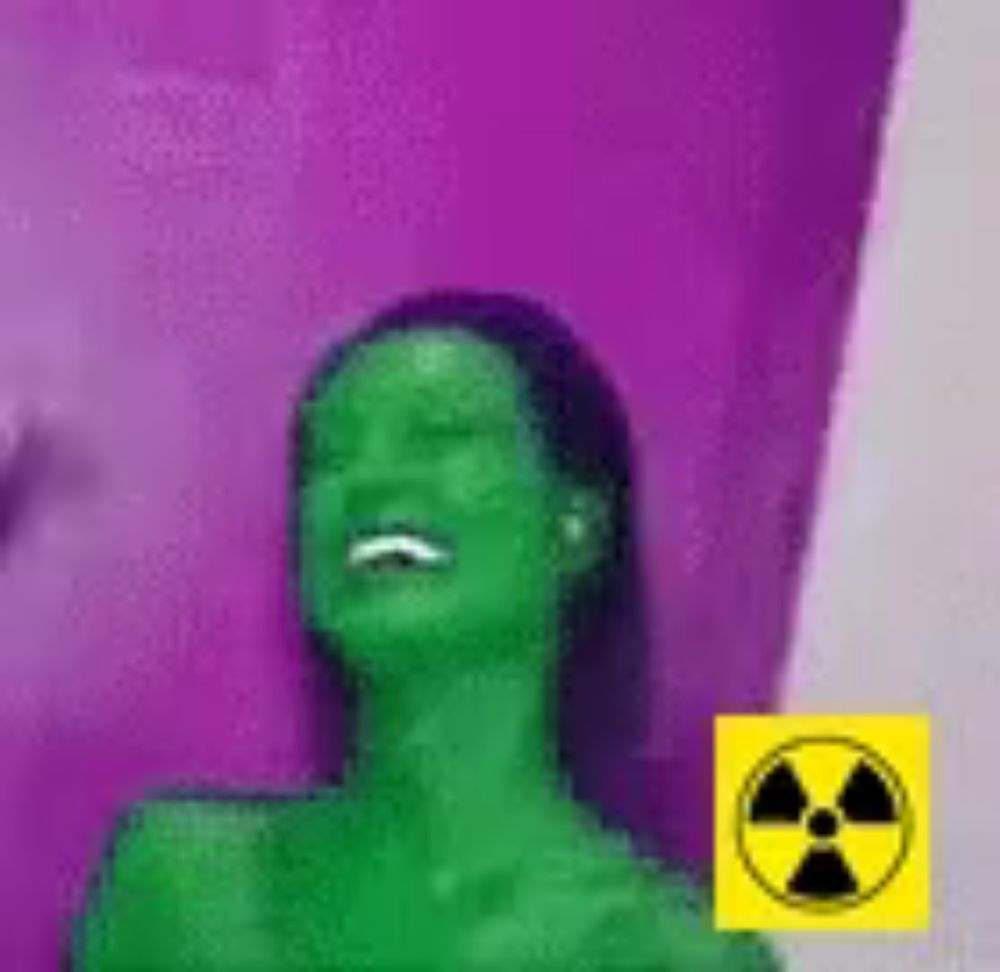 a woman with green hair and a yellow radioactive symbol