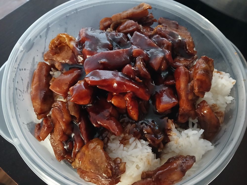 Roasted chicken thighs finished in a reduced soy, red wine, and hoisin sauce served over rice.