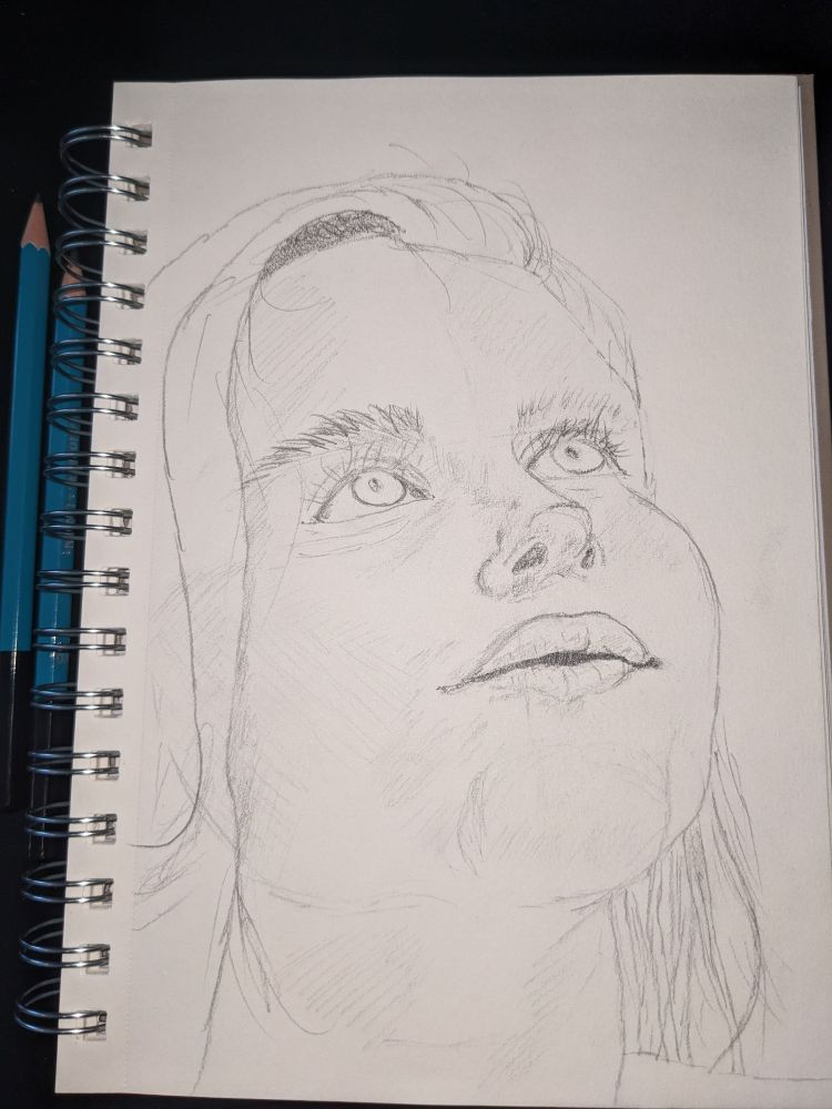 Portrait sketch of a girl looking upward