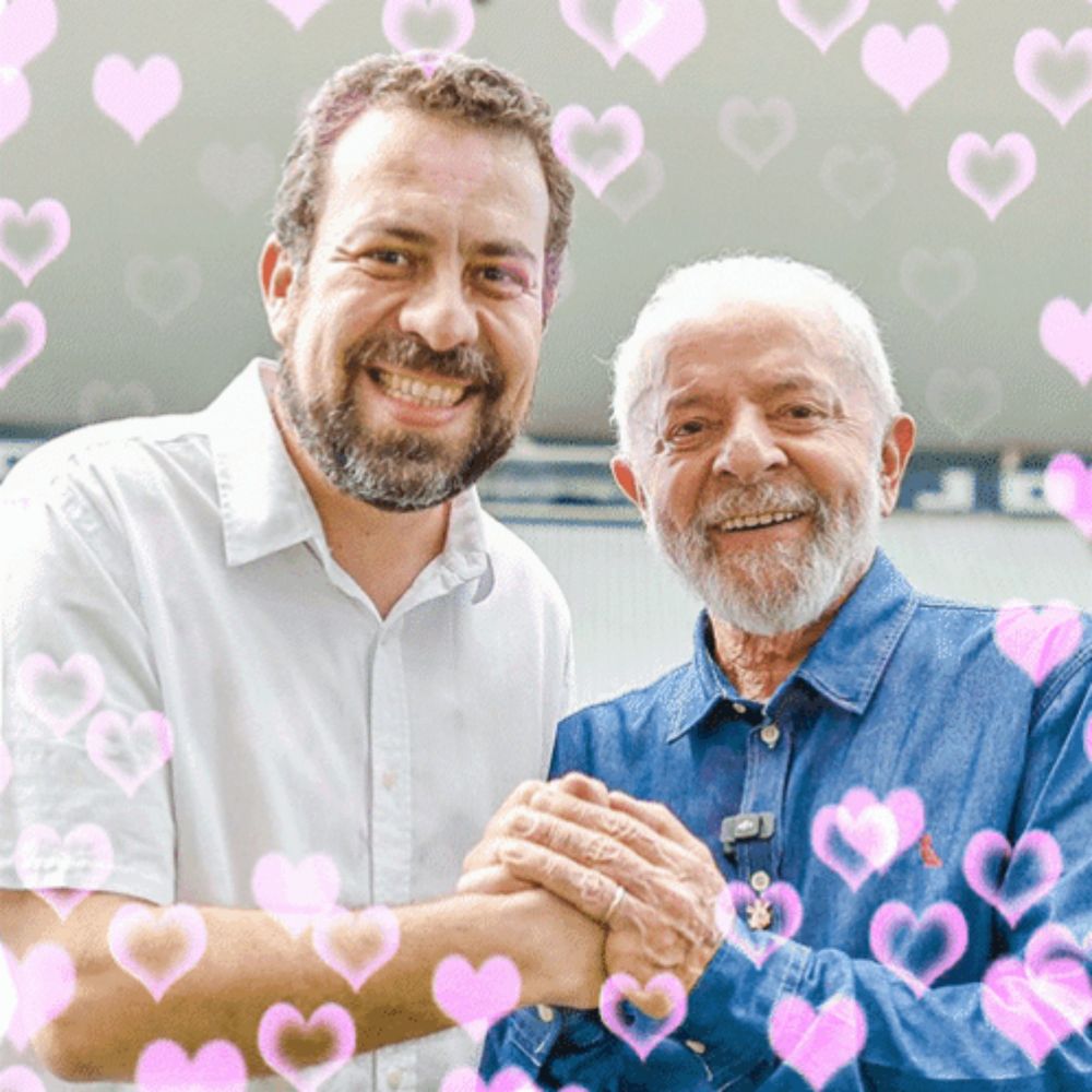 two men are shaking hands with pink hearts behind them