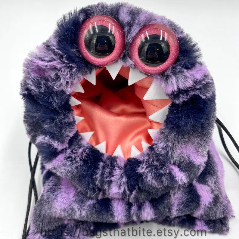 Big eyed dice bag of devouring drawstring bag