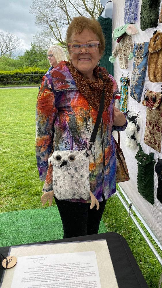 Fabulous woman dressed to the nines with my owl Bags that Bite on her. 
