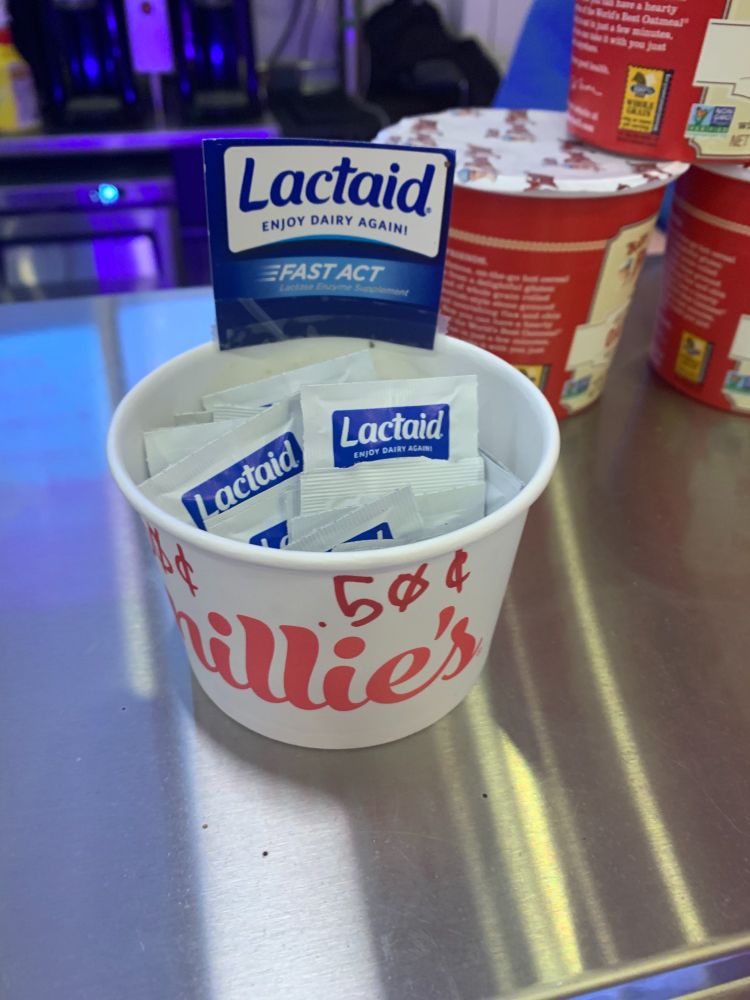 Lactaid on the counter of an ice cream parlor