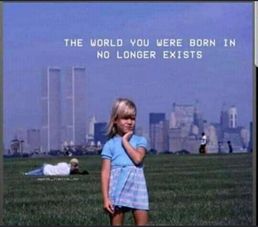 A child pre-9/11 standing in a field with the twin towers in the background with a caption that reads “the world you were born in no longer exists” 